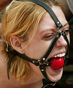 Roped, ball-gagged and trained outdoors